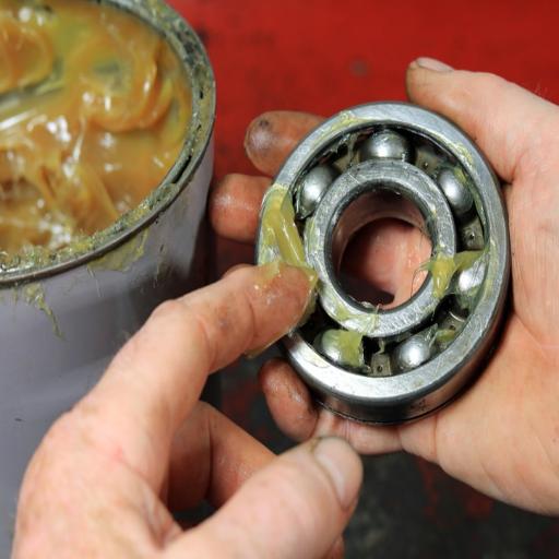 when to use grease vs oil
